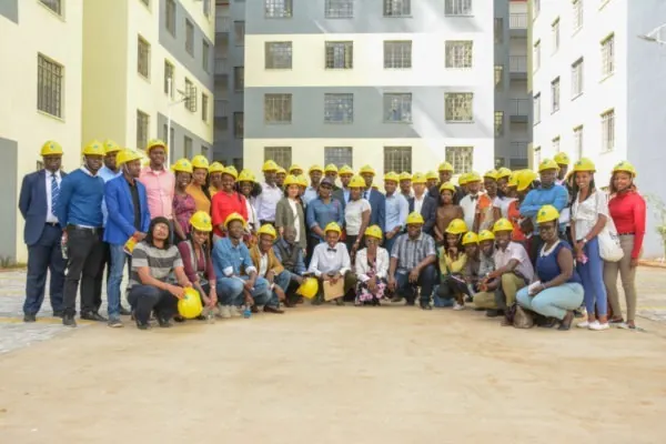 AAK members in hard hats on a build tour