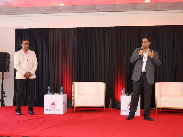 Two speakers on stage during a Day 3 session
