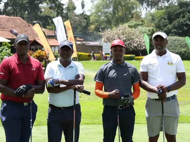 A four-ball with sponsors' banners behind