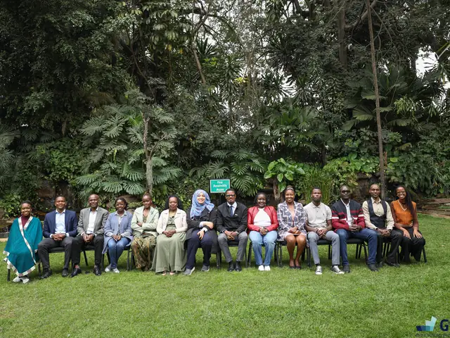 A seated group photo in the garden