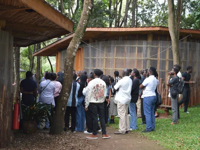 Touring the school's timber classroom buildings